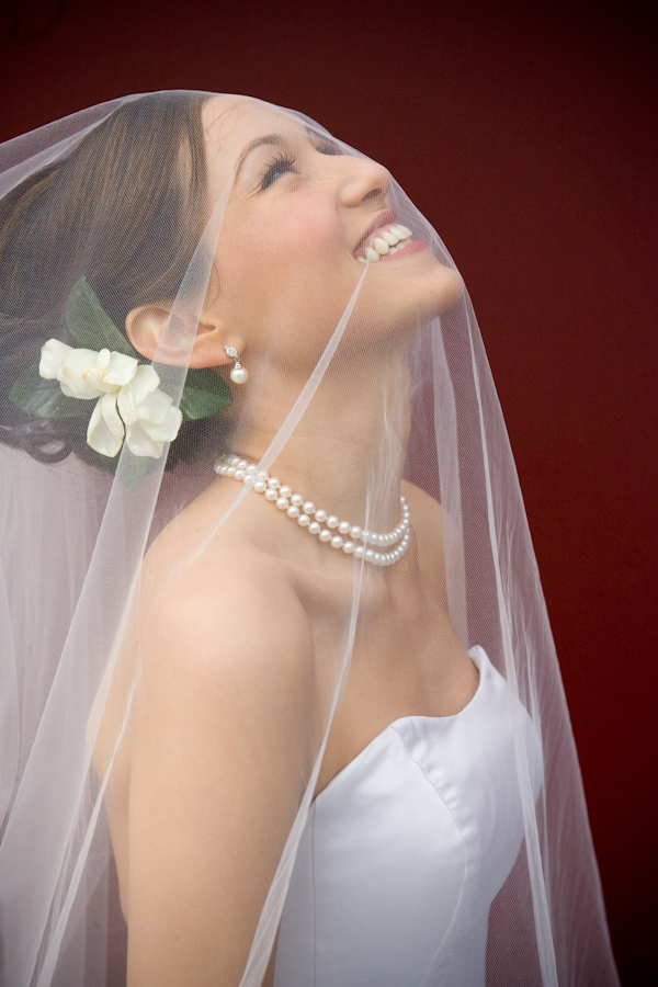 wedding photo by J Garner Photography, beautiful bride, white floral hair accessory